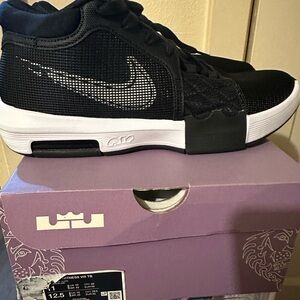 Nike Black Mesh Athletic Shoes with White Accents